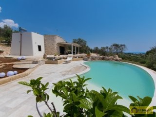 foto immobile Villa con Piscina Vista Mare con meraviglioso giardino, a Pescoluse n. 10