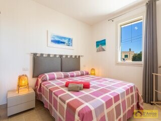 foto immobile Villa con Piscina vista mare a Pescoluse n. 22